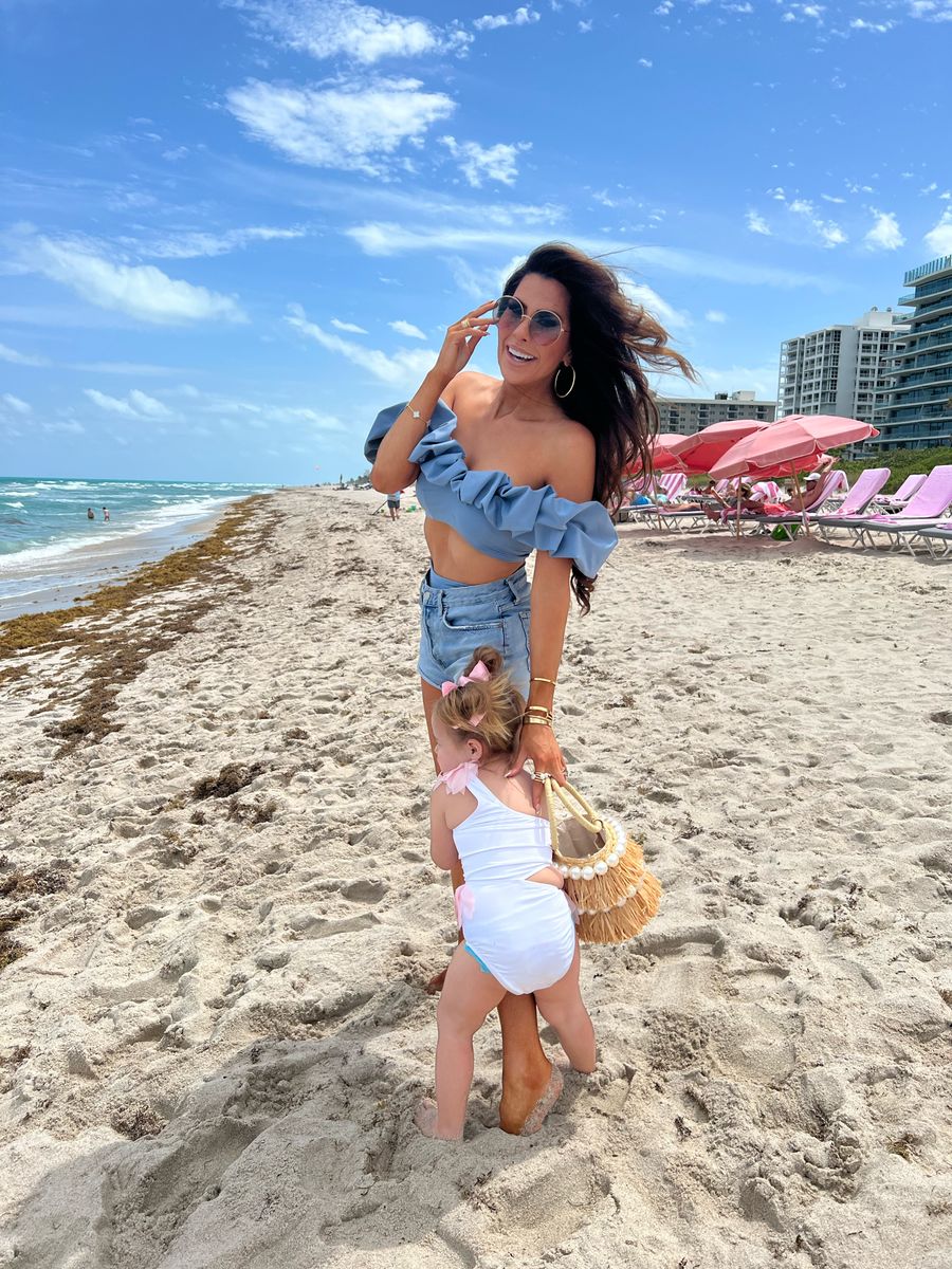 Maygel Coronel Lucila Ruffled Bikini, BTB Los Angeles Skylar Straw Pearly Bucket Bag, Agolde Parker Cutoff Shorts, Emily Ann Gemma