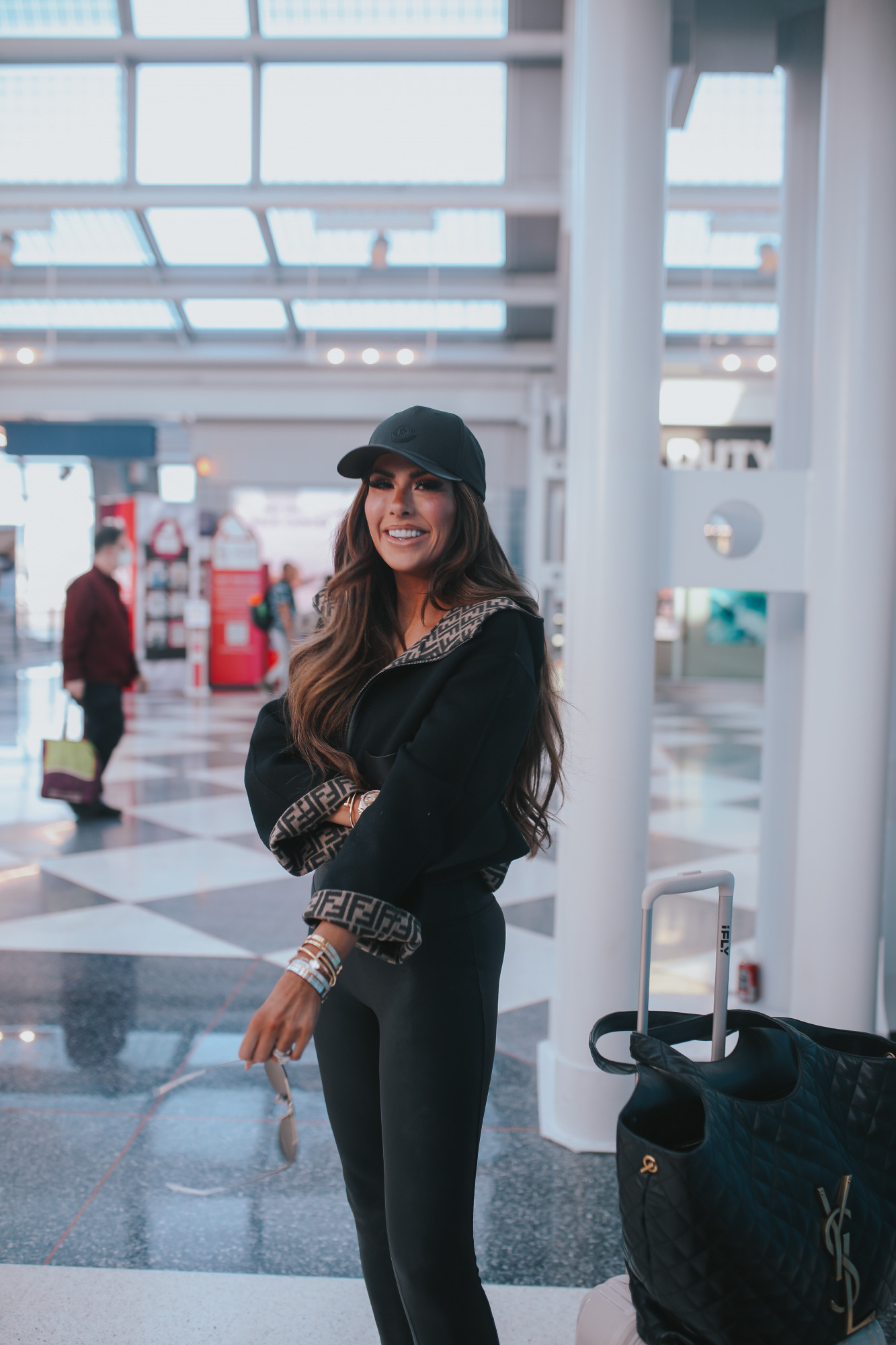 https://www.thesweetestthingblog.com/wp-content/uploads/2022/11/moncler-baseball-cap-spanx-leggings-review-best-flattering-faux-leather-leggings-airport-outft-idea-fall-pinterest.jpg