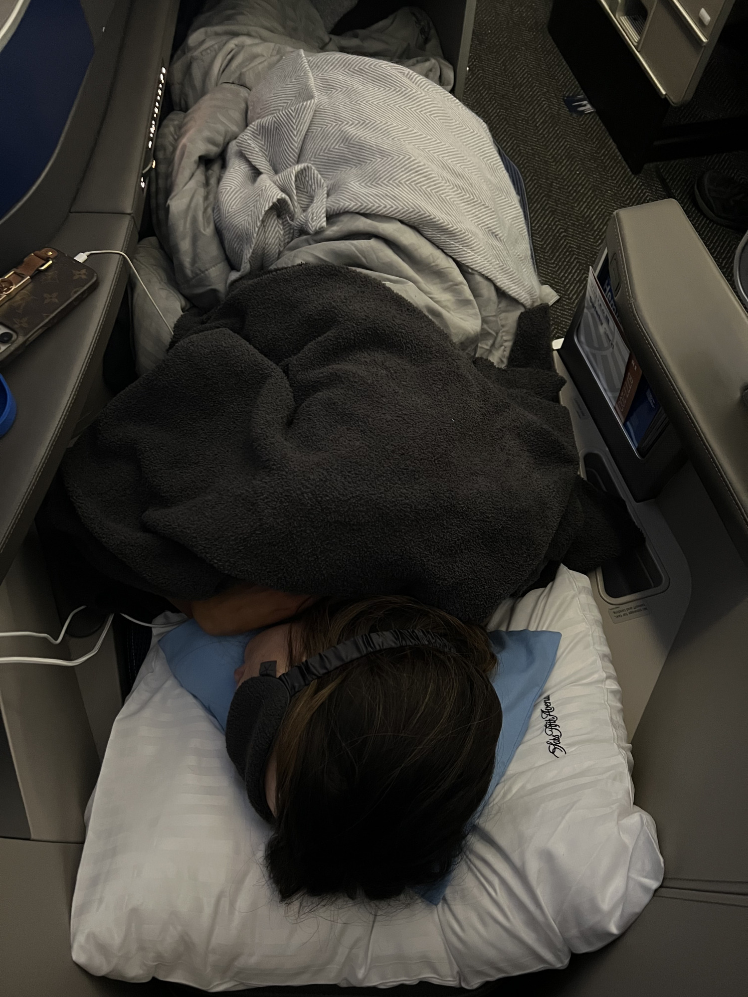 United international first class seats, united Polaris first class to Paris, Emily Gemma