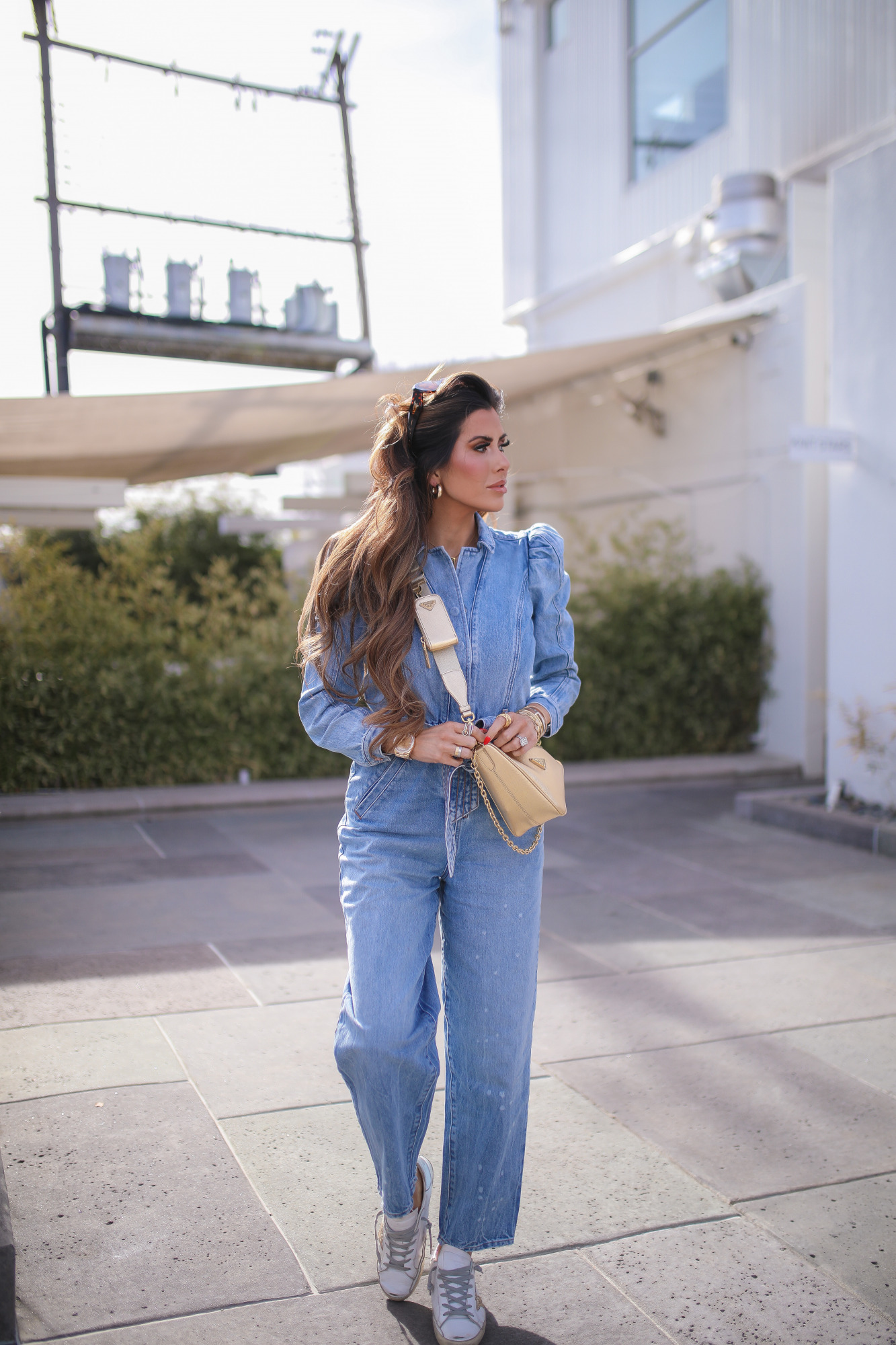 express denim jumpsuit, golden goose sneaker outfit idea, prada gold triangle bag, emily ann gemma2