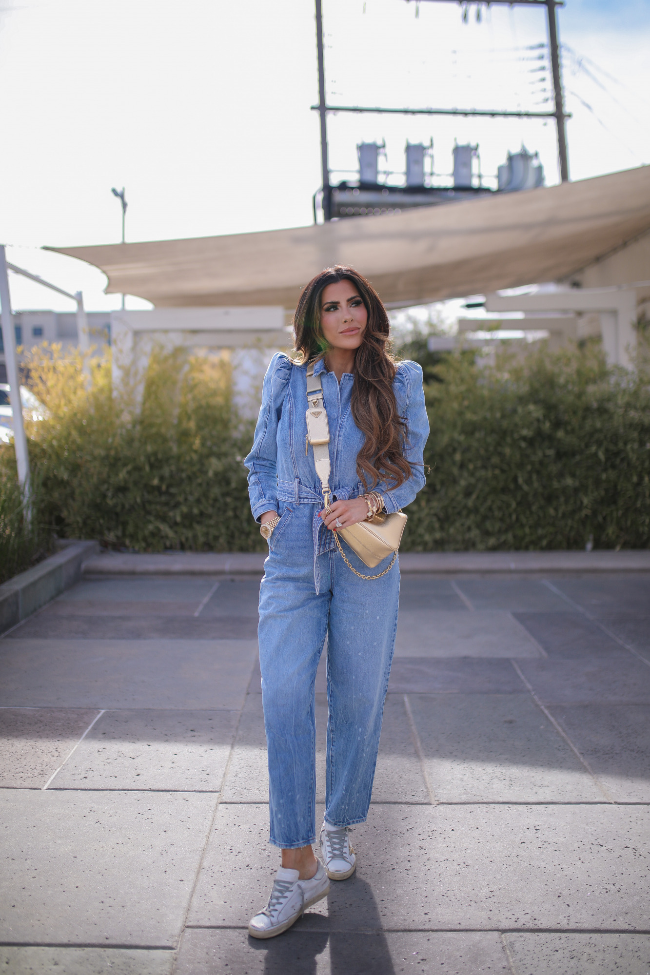 express denim jumpsuit, golden goose sneaker outfit idea, prada gold triangle bag, tulsa fashion blogger5