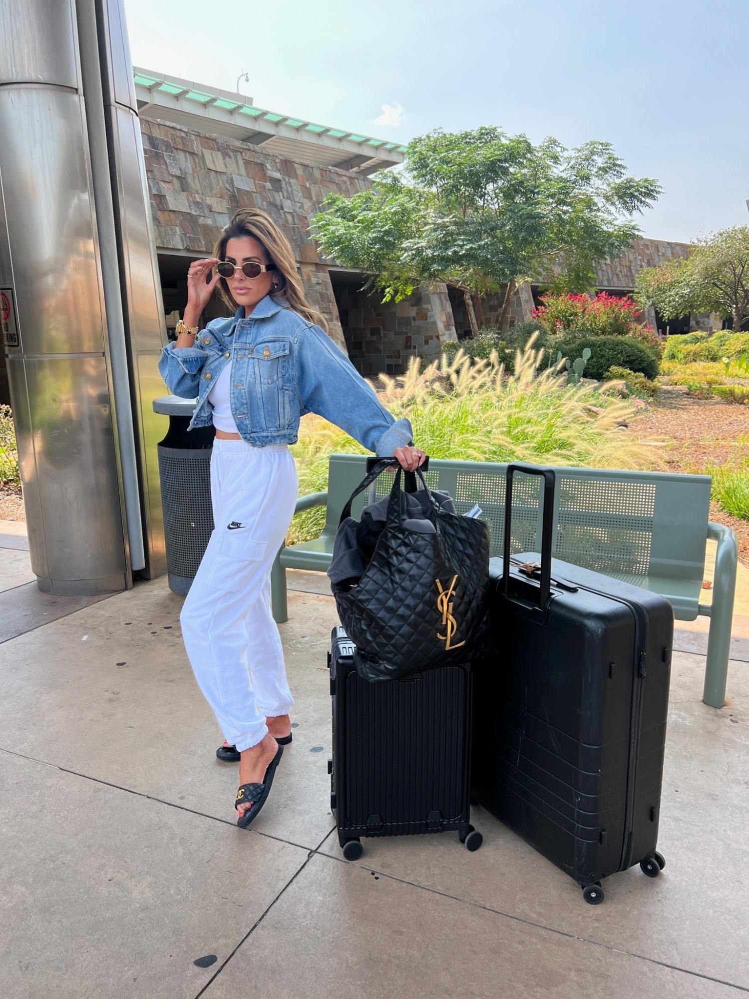 Floral romper : Louis Vuitton bag : Shoes : sunglasses : Ripped Denim Jacket  BP.