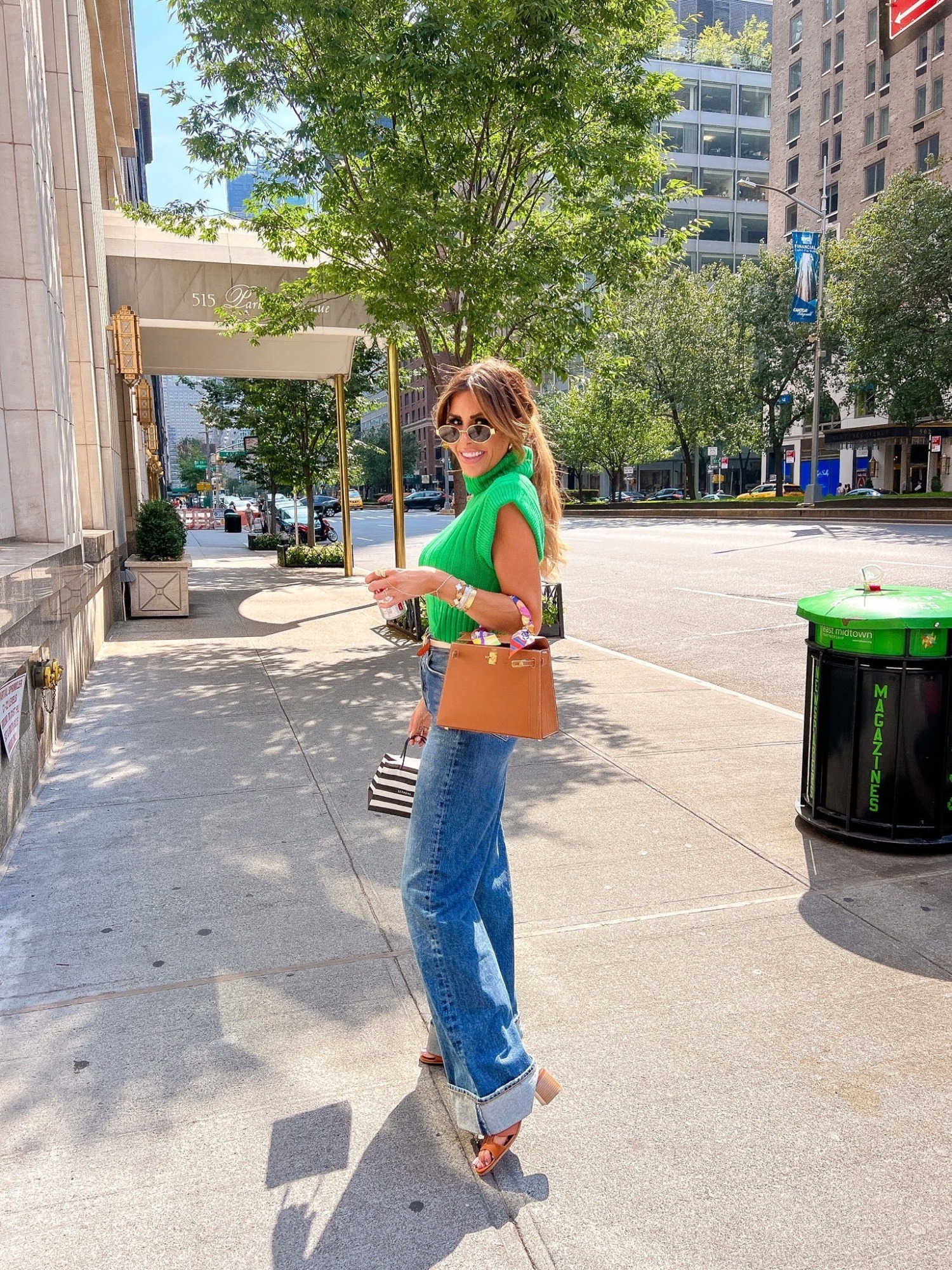 Floral romper : Louis Vuitton bag : Shoes : sunglasses : Ripped Denim  Jacket BP.