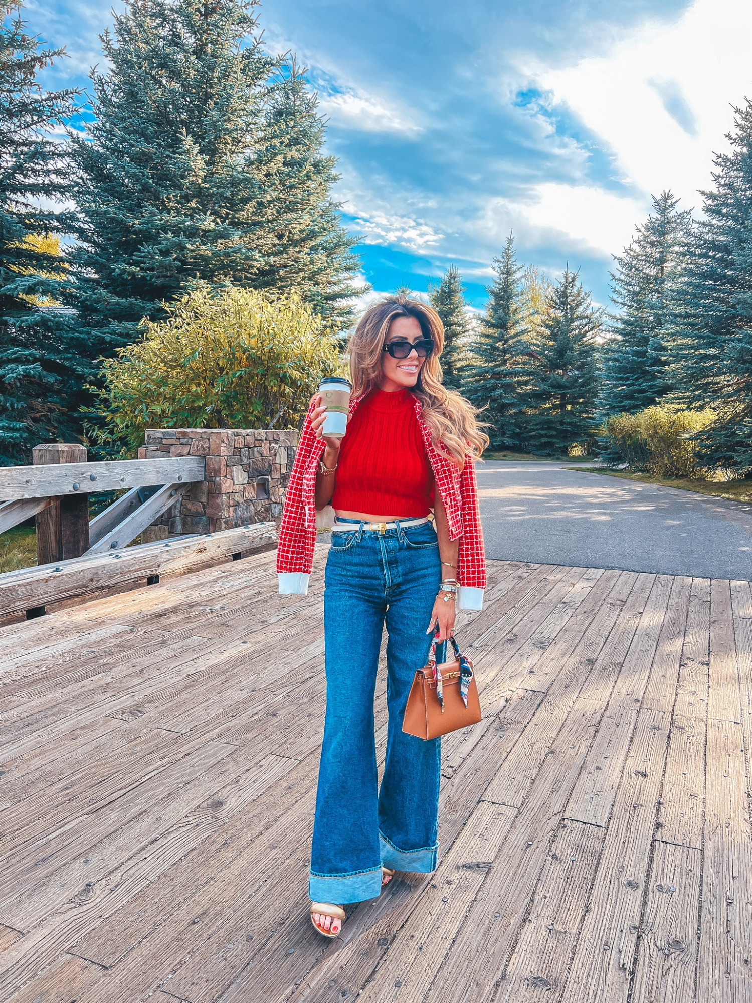 fall fashion 2024 outfit idea Jackson Hole, Bomber jacket outfit fall 2024, Hermes Kelly 25 Gold, Agolde Dame Cuffed Jeans, Celine Triomphe Sunglasses, Emily Ann Gemma